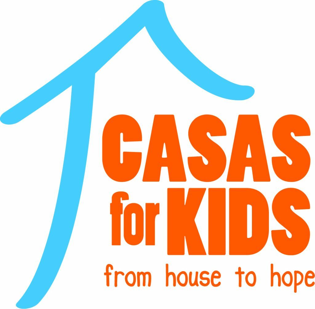 A blue outline of a house with the words "Casas for kids" in big orange letters and in small orange letters "from house to hope"